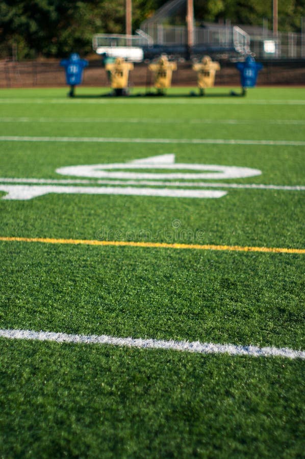 Football Field With Practice Dummy Sled In Background Stock Image