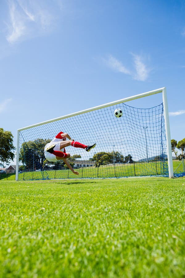 Football Player Scoring a Goal Stock Photo Image of football