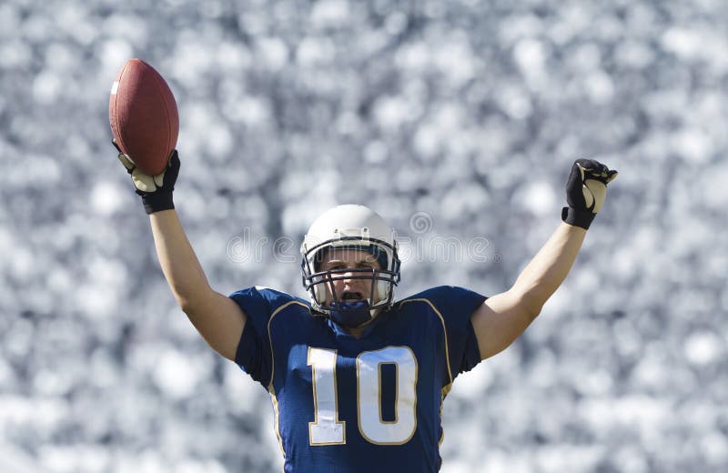 Football Player Scoring a Touchdown royalty free stock photography