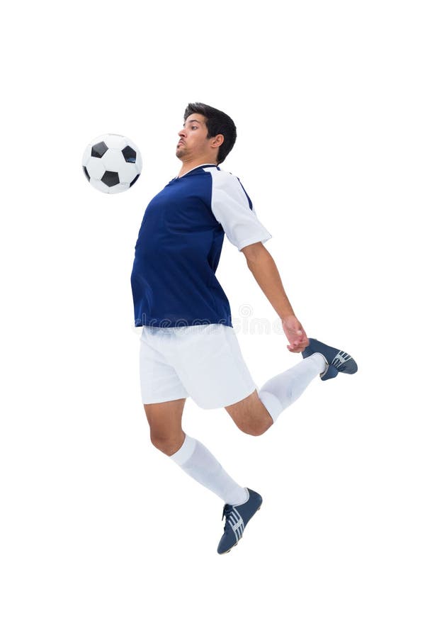 Football player in white playing royalty free stock photography