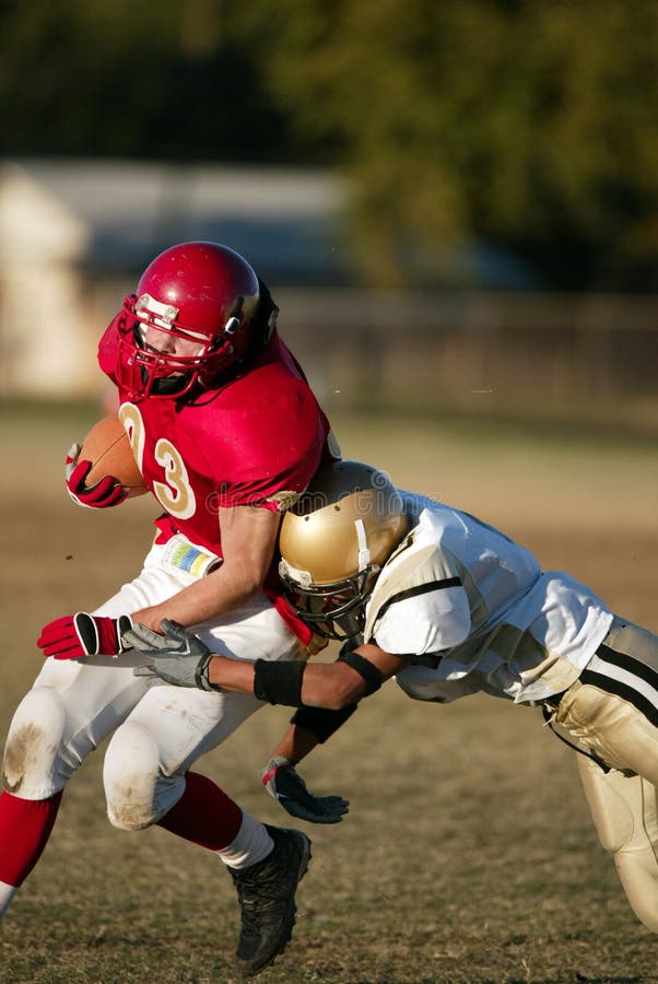 Football tackle stock image. Image of play, cleats, pads - 3135553