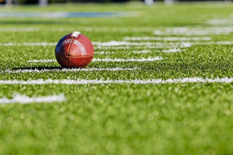 Football on Yardage Line stock image. Image of close, field 3292109