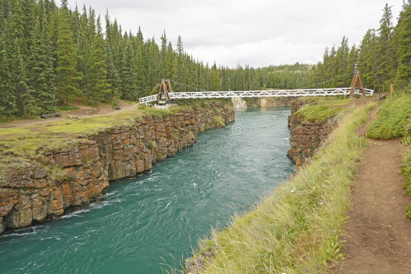 Footbridge over a River Canyon royalty free stock photography Footbridge over a River Canyon royalty free stock photography