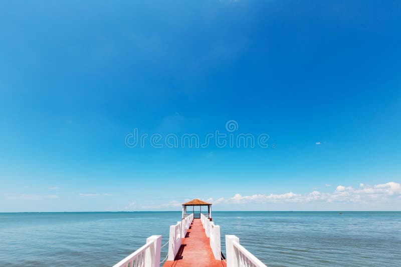 Footbridge in the caribean sea at the beach in Manzanillo in Cuba. Footbridge in the caribean sea at the beach in Manzanillo in Cuba