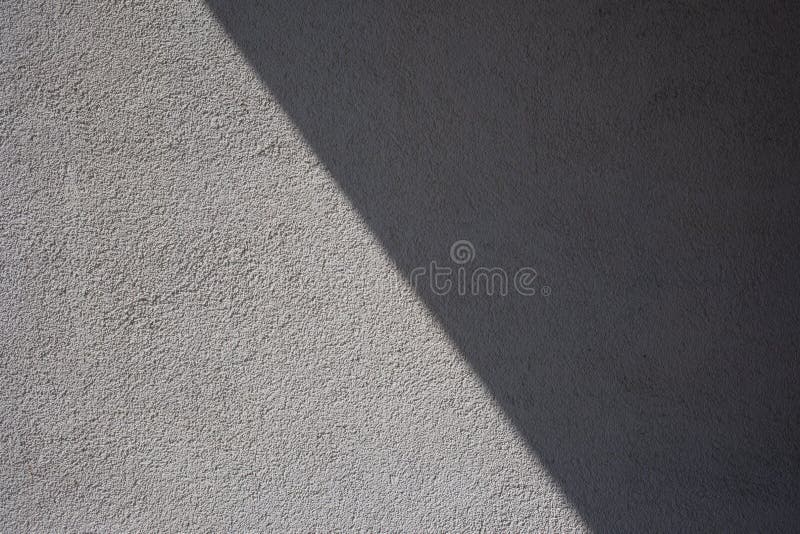 Parede exterior, textura de gesso cinzento, sombra fotos de stock