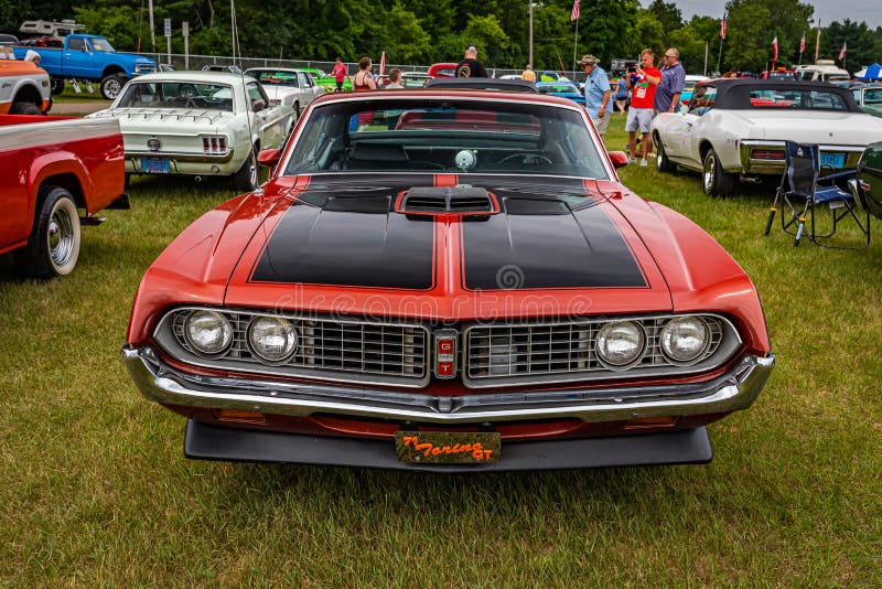 Iola, WI - July 07, 2022: High perspective front view of a 1971 Ford Torino GT 2 Door Hardtop at a local car show