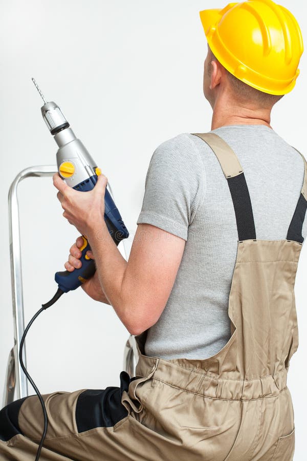 Foreman with drill stock photo