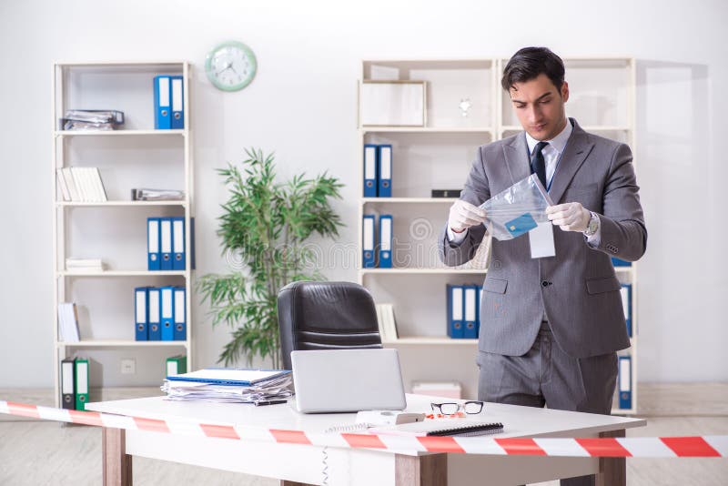 The forensics investigator at the scene of office crime