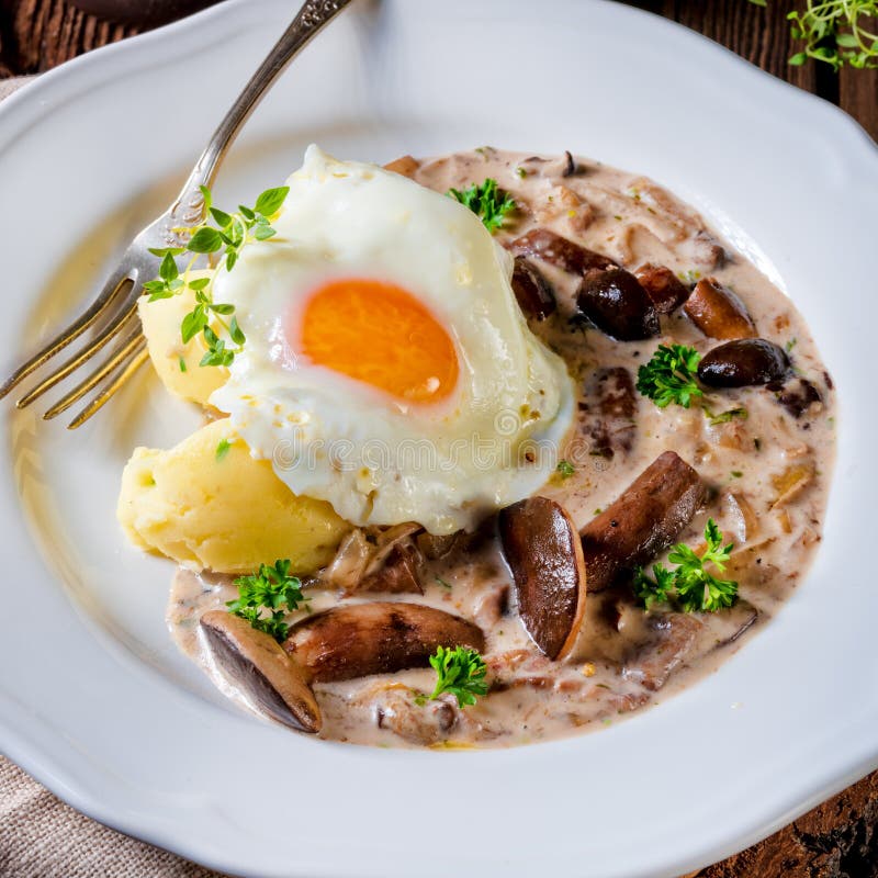 Forest mushroom sauce with fresh mushrooms, potato and poached. Diet, food.