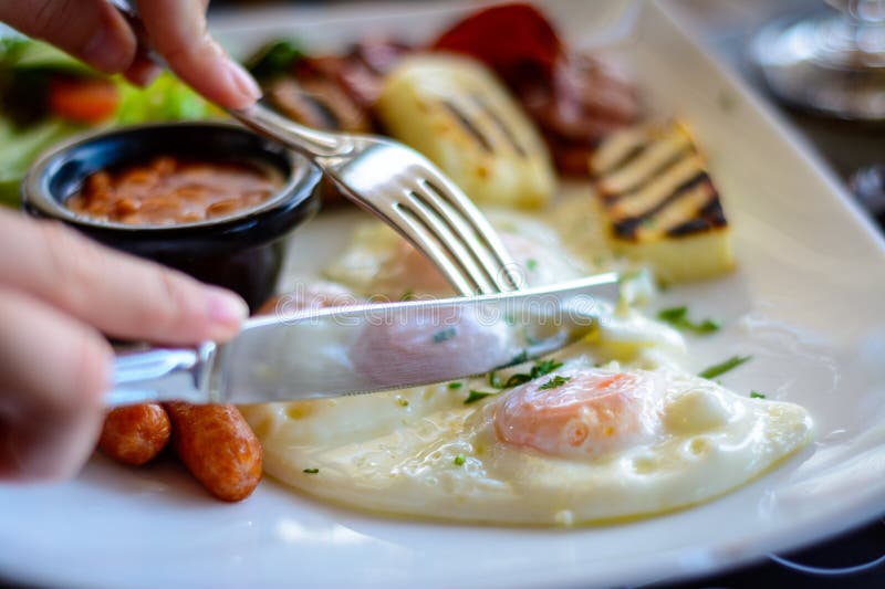 English Brekfast, Eggs and Beans, Fork and Knife Stock Image Image of