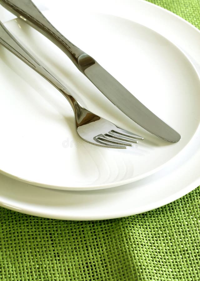 Fork and Knife on White Plates Stock Image Image of color, equipment 13853465