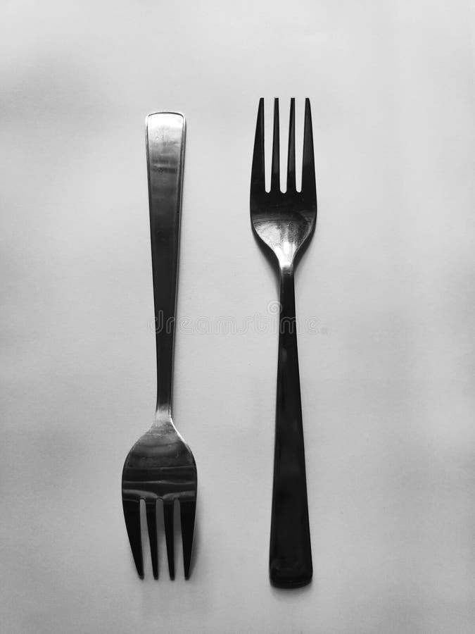 Fork Spoon Kitchen Utensils with Black Background and Wallpaper Stock