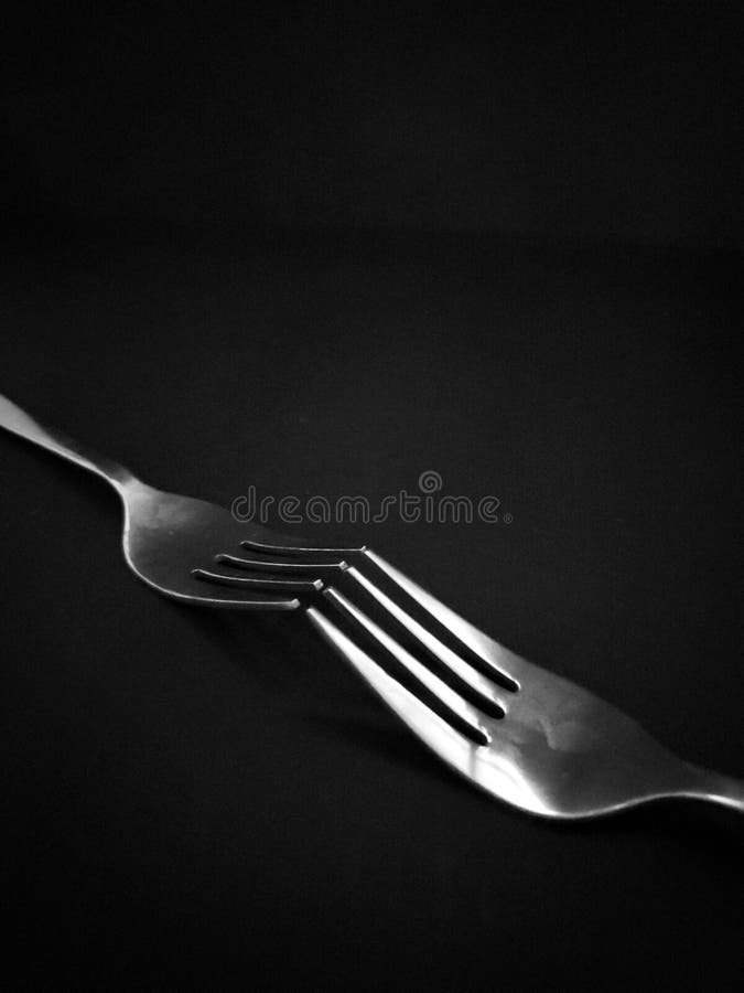 Fork Spoon Kitchen Utensils with Black Background and Wallpaper Stock