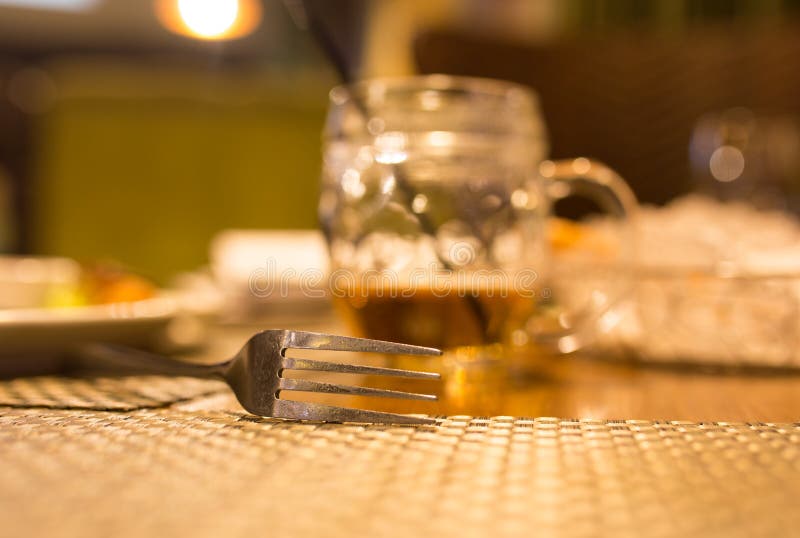 Fork on the table in the restaurant stock image Fork on the table in the restaurant stock image
