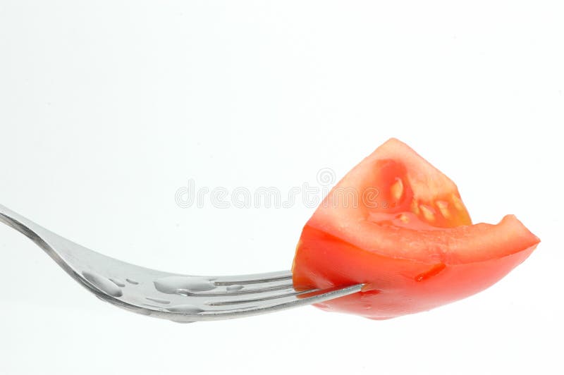Fork and tomate