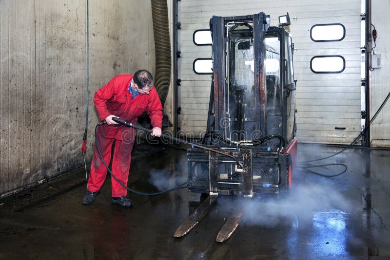 Steam Cleaning Windows with Pressure Editorial Photography - Image