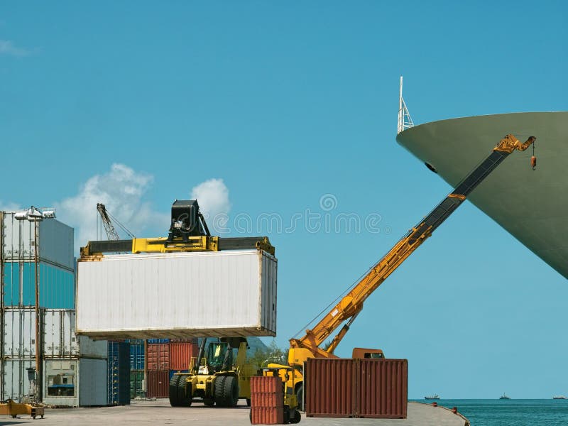 Forklift, crane in busy container port.