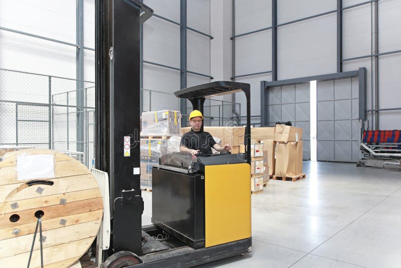 Drive pallet jack stock image. Image of delivering, indoor 31657685