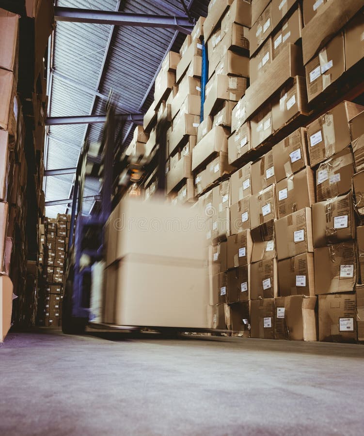Forklift in large warehouse stock photos Forklift in large warehouse stock photos