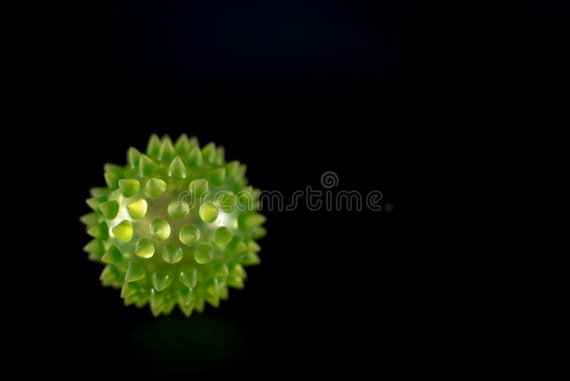 Medical type virus on a black background with copyspace using defocus. Medical type virus on a black background with copyspace using defocus