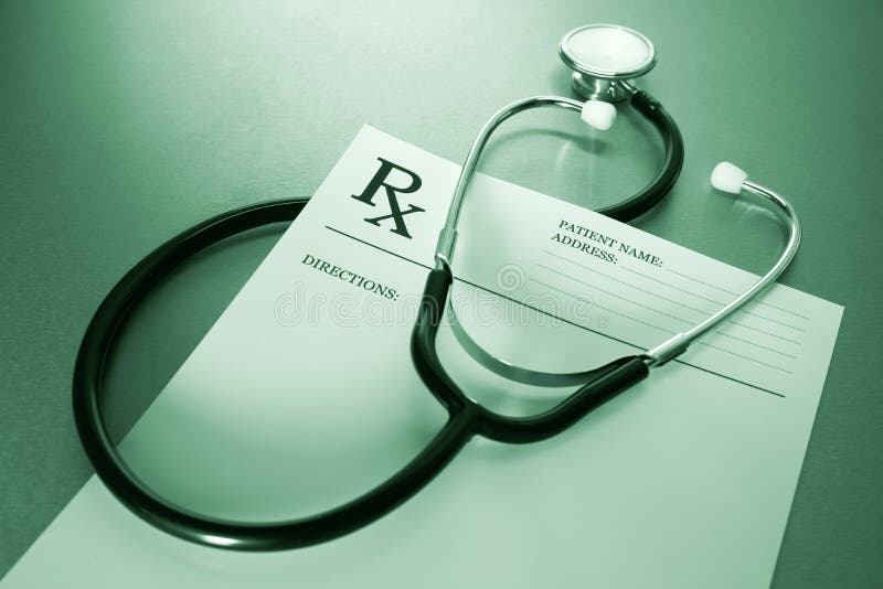 RX prescription form and stethoscope on stainless steel desk blue tone. RX prescription form and stethoscope on stainless steel desk blue tone
