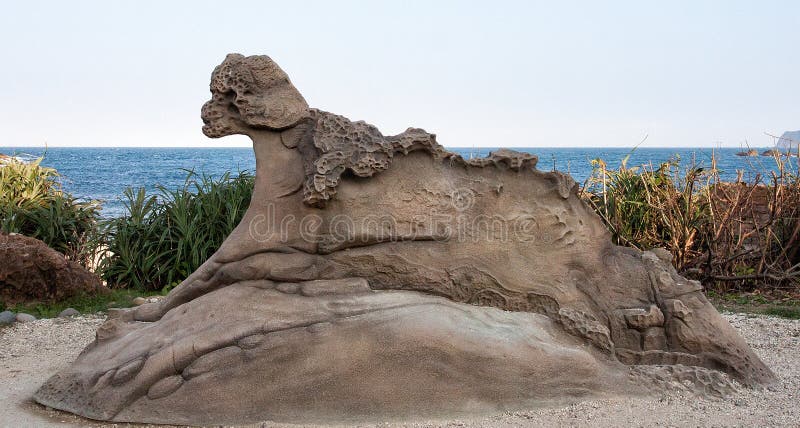 Formación de roca del perro de Taiwán, geopark de Yehliu imagen de archivo libre de regalías Formación de roca del perro de Taiwán, geopark de Yehliu imagen de archivo libre de regalías