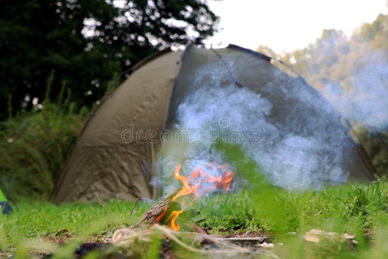 Young man practicing survival training at the river. Young man practicing survival training at the river