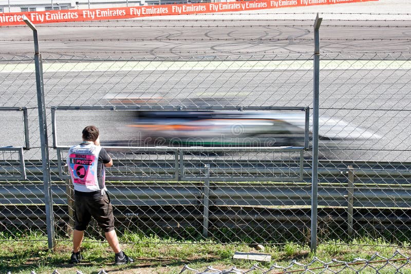Monza, Italia - September 06: Photographer in aciton - photographing a car, Force India. Autodromo Nazionale Monza: 04.-06.09.2015 - FORMULA 1 GRAN PREMIO D'ITALIA 2015, Monza