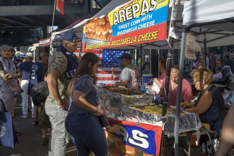 BRONX, NEW YORK/USA - August 31, 2020: Vendor selling food duing outdoor festival near Yankee Stadium. BRONX, NEW YORK/USA - August 31, 2020: Vendor selling food duing outdoor festival near Yankee Stadium