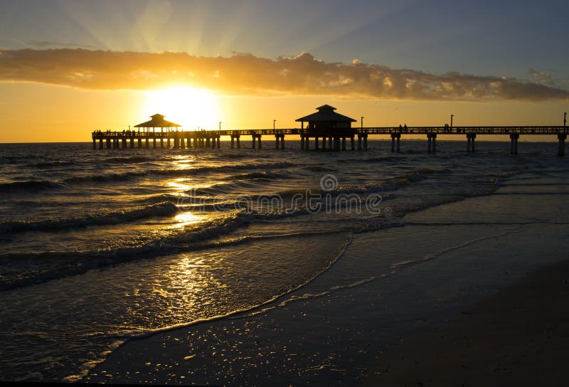 Fort Myers Beach Pier, sunset stock image