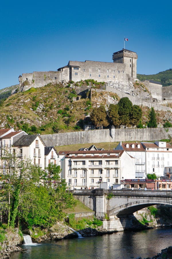 Fort Pyrenean Castle and Ousse River, Lourdes, France Editorial ...