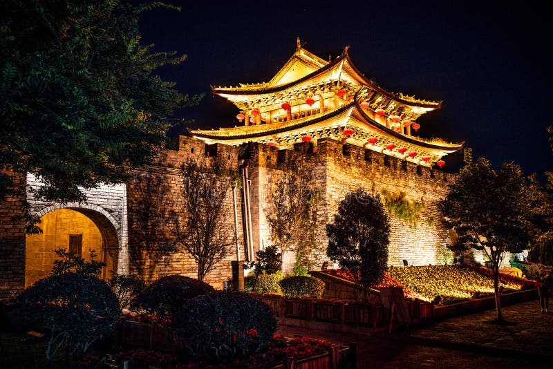 Fortification wall and south gate of Dali old town illuminated at night Dali Yunnan China