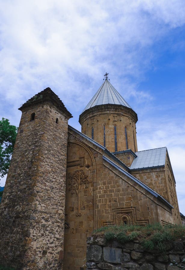 Fortress in Georgia on the shore of the Ginval reservoir. Old Orthodox church. Ananuri Fortress. Unusual old fortress. Attractions of Georgia. Ananuri Fortress stock photography Fortress in Georgia on the shore of the Ginval reservoir. Old Orthodox church. Ananuri Fortress. Unusual old fortress. Attractions of Georgia. Ananuri Fortress stock photography