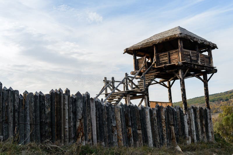 Wooden palisade with a tower of Vikings