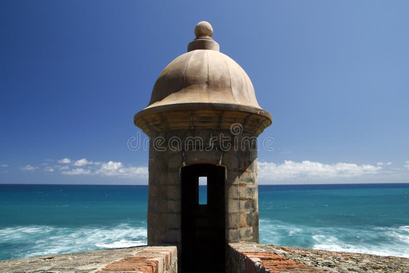 A beautiful view of a guerite, or sentry box, along the coastal side of Fort San Cristobal in Old San Juan, Puerto Rico. Also known as Castillo de San Cristóbal, it was the largest fort ever built by the Spanish in the New World, designed to help protect San Juan from land based attacks. A beautiful view of a guerite, or sentry box, along the coastal side of Fort San Cristobal in Old San Juan, Puerto Rico. Also known as Castillo de San Cristóbal, it was the largest fort ever built by the Spanish in the New World, designed to help protect San Juan from land based attacks.