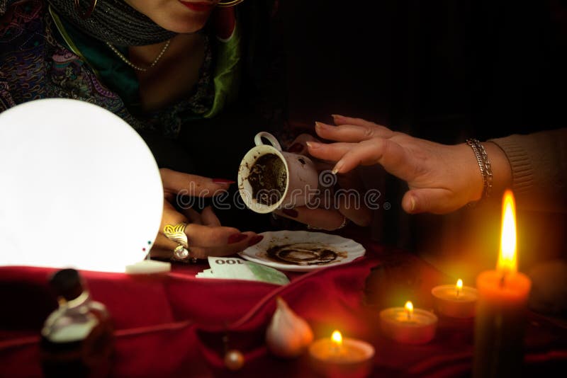 Fortune Teller Read a Fortune from Coffee Mug Stock Photo Image of