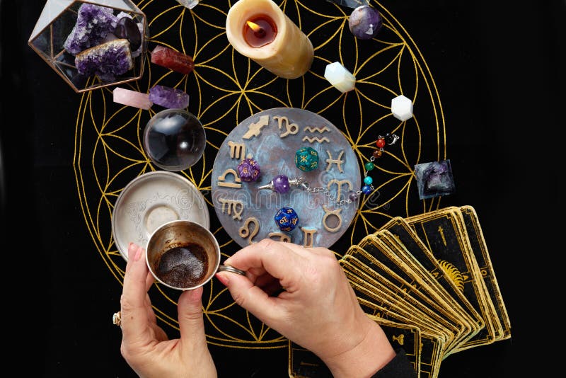 Fortune Telling Table with Tarot Cards and Esoteric Objects. Fortune