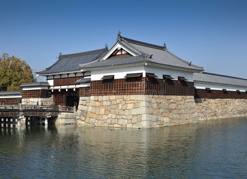 MS: The moat defending the Hiroshima castle in Japan; Very typical of Japanese architecture of the period this castle was defended by three sets of encircling moats. MS: The moat defending the Hiroshima castle in Japan; Very typical of Japanese architecture of the period this castle was defended by three sets of encircling moats