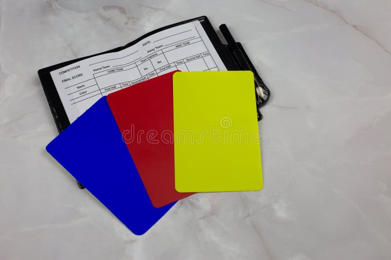 Football referee set for chest pocket, match chronology notepad and set of cards in different colors, blue, red, yellow football cards. Football referee set for chest pocket, match chronology notepad and set of cards in different colors, blue, red, yellow football cards