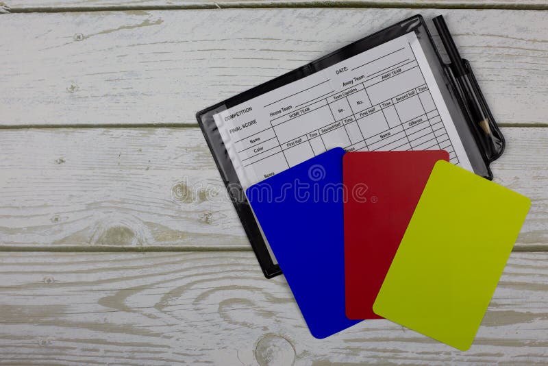 Set of football referee with notepad and blue card, changes in football rules, blue card concept in football. Set of football referee with notepad and blue card, changes in football rules, blue card concept in football