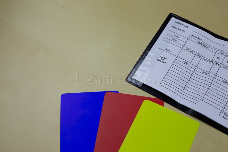 Football referee cards with new blue card with notepad for chest pocket of sports jersey. Football referee cards with new blue card with notepad for chest pocket of sports jersey