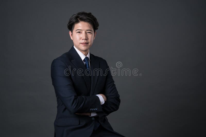 Foto asiática del este del retrato del estudio del tiroteo del hombre de negocios fotos de archivo Foto asiática del este del retrato del estudio del tiroteo del hombre de negocios fotos de archivo