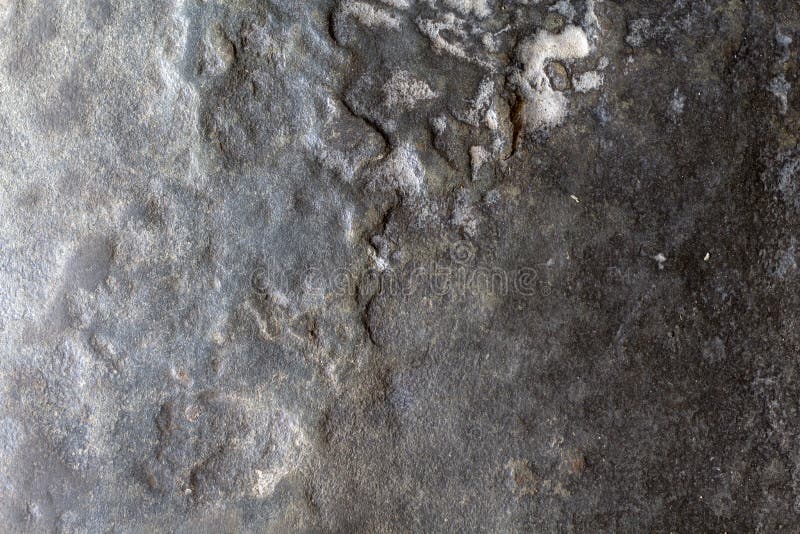 Foto de pedra cinzenta da textura Fundo de pedra natural Relevo resistido da rocha Superfície desigual do arenito imagens de stock Foto de pedra cinzenta da textura Fundo de pedra natural Relevo resistido da rocha Superfície desigual do arenito imagens de stock
