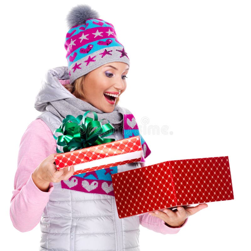 Foto della donna sorpresa felice con un regalo di natale fotografia stock Foto della donna sorpresa felice con un regalo di natale fotografia stock