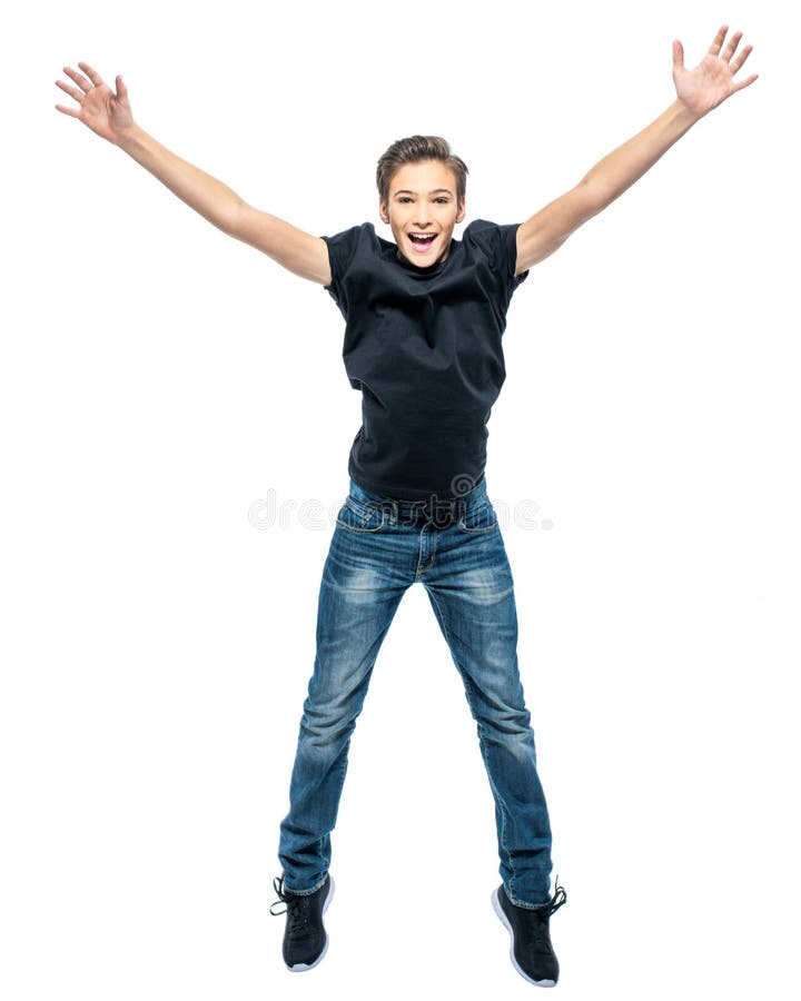 Foto do adolescente feliz que salta com mãos acima imagens de stock Foto do adolescente feliz que salta com mãos acima imagens de stock