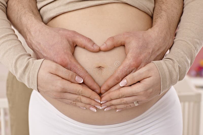 Foto do close up da barriga grávida imagens de stock royalty free