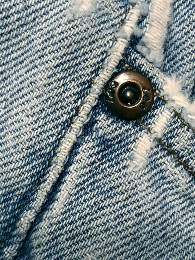 Foto em detalhe de um par de calças de denim. foto de stock royalty free