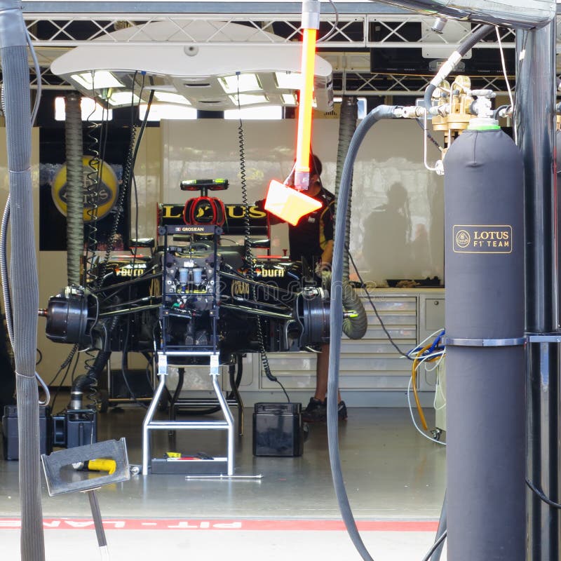 F1 Photo : Formula 1 Lotus Race Car in paddock. F1 Photo : Formula 1 Lotus Race Car in paddock