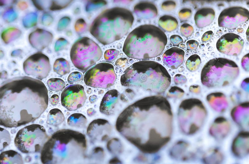 Foto macro de bolhas de sabão coloridas fotografia de stock royalty free Foto macro de bolhas de sabão coloridas fotografia de stock royalty free