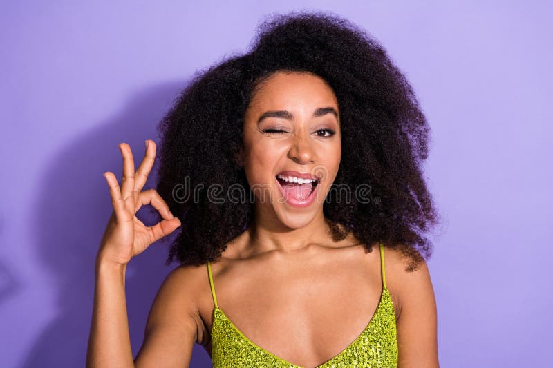 Photo of cute funny gorgeous woman wear trendy clothes demonstrate okey symbol isolated on violet color background. Photo of cute funny gorgeous woman wear trendy clothes demonstrate okey symbol isolated on violet color background.